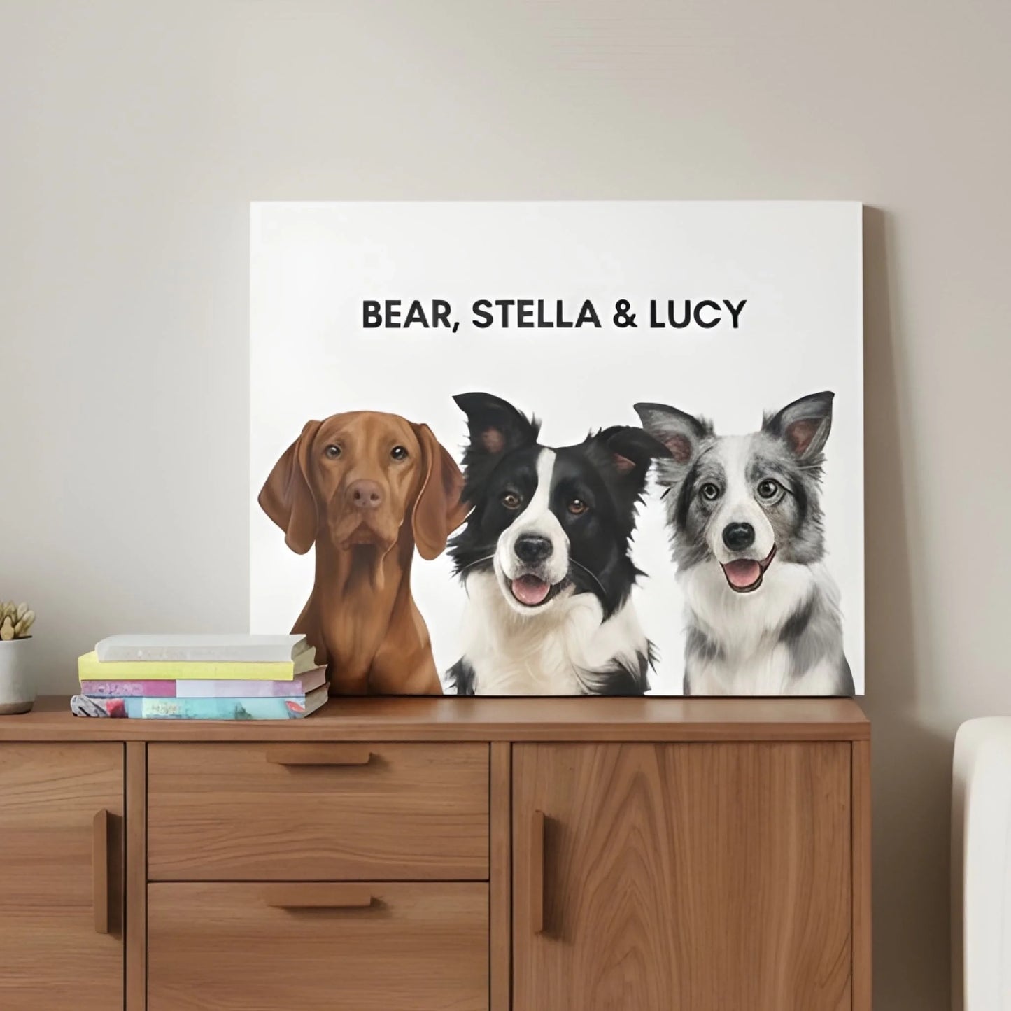 Painted dog portrait canvas with three pets in a stylish lifestyle room setting